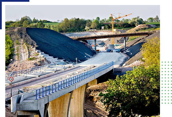 A bridge with some blue and white construction materials